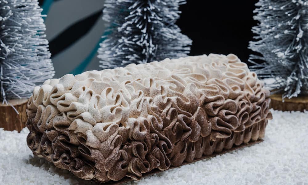 White forest: Our signature Christmas log. Composed of a 72% chocolate mousse, an icelandic spruce ganache, brownie and caramelised pined nuts.